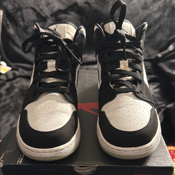 Black and White High-Top Air Jordan 1 Sneakers